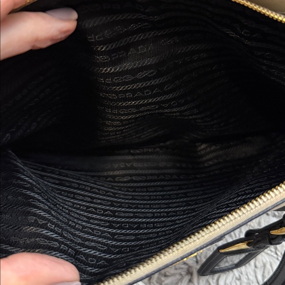 Prada Black and Cream Satchel
Saffiano Leather
Beautiful Handbag - Picture 12 of 12